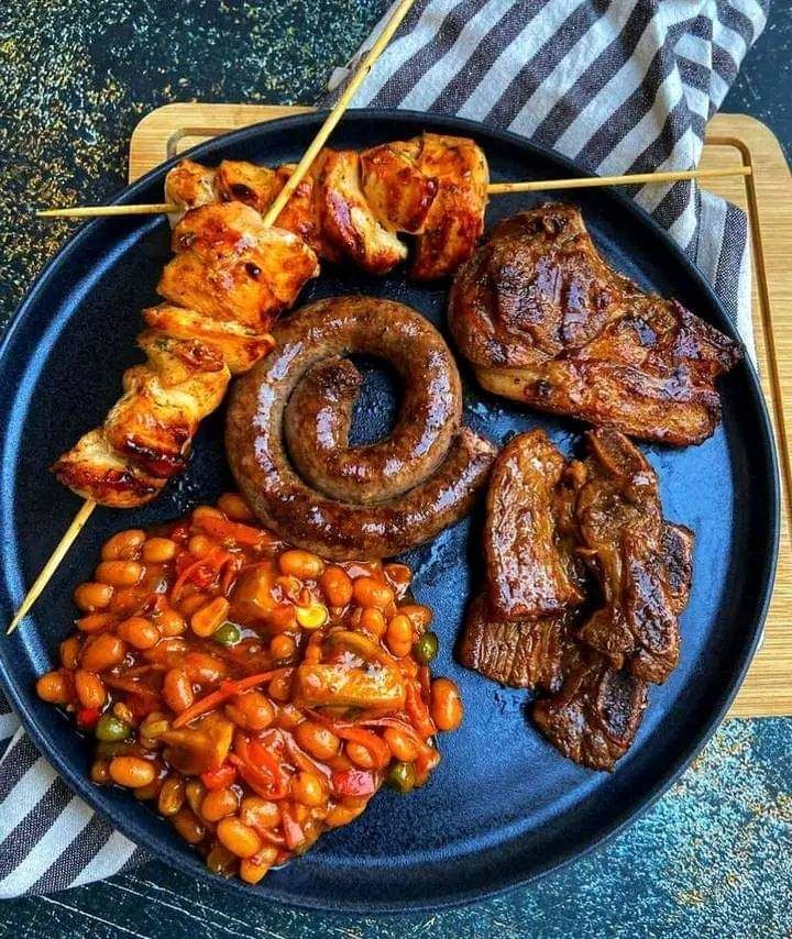 Braai platter with boerewors, chicken skewers and baked beans